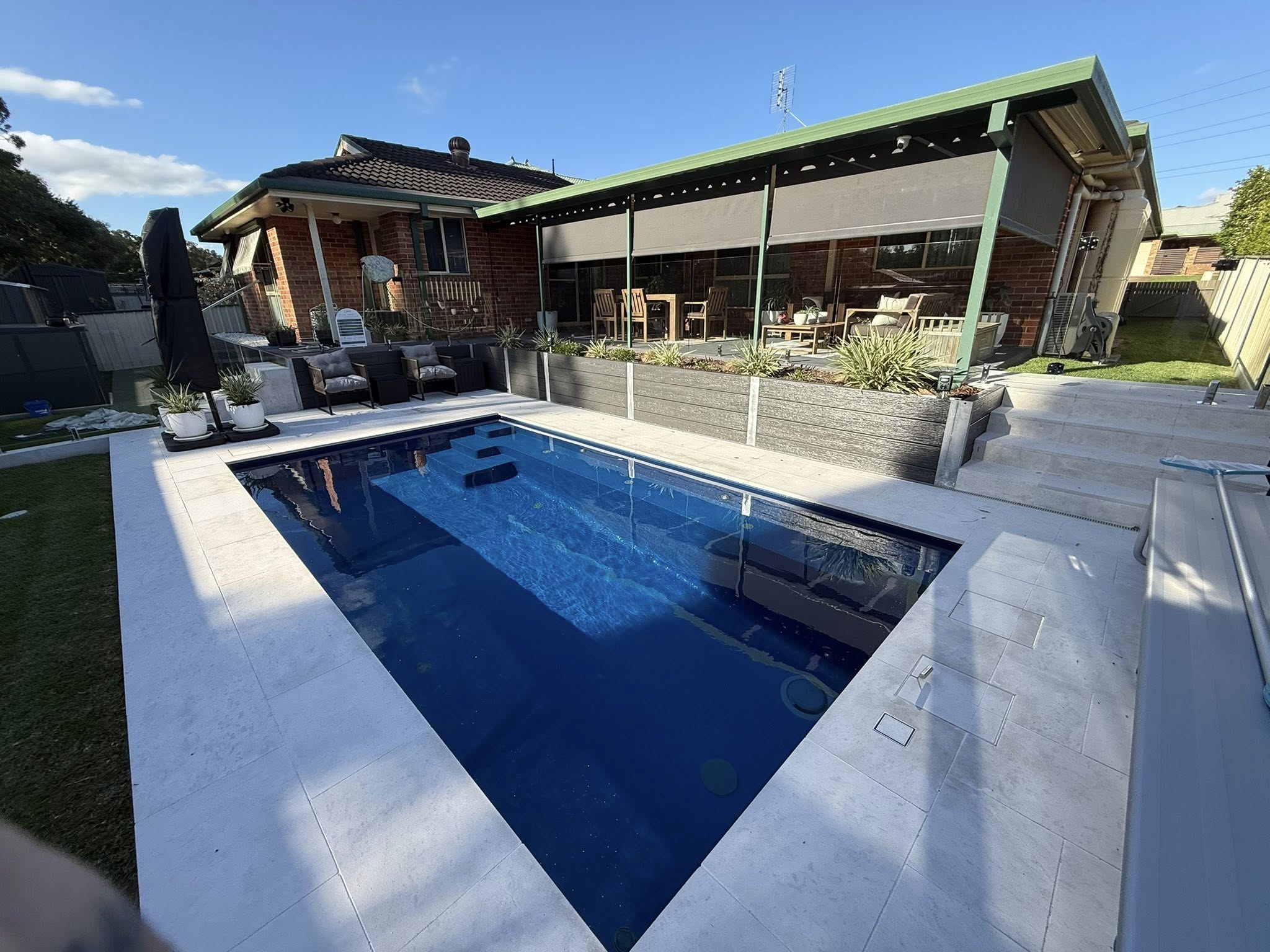Backyard entertaining area and pool surround painting by Hughesys Painting Newcastle