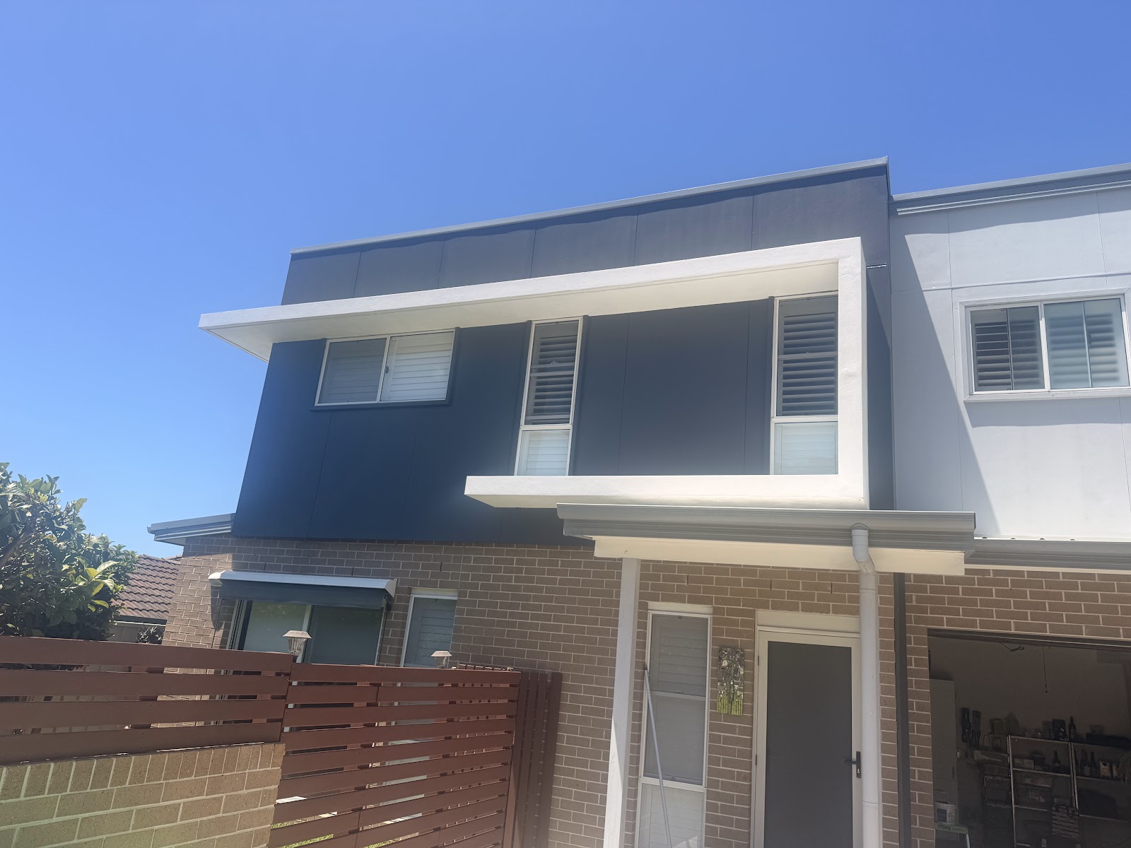 Exterior painting Newcastle — modern two-storey home freshly painted by Hughesys Painting